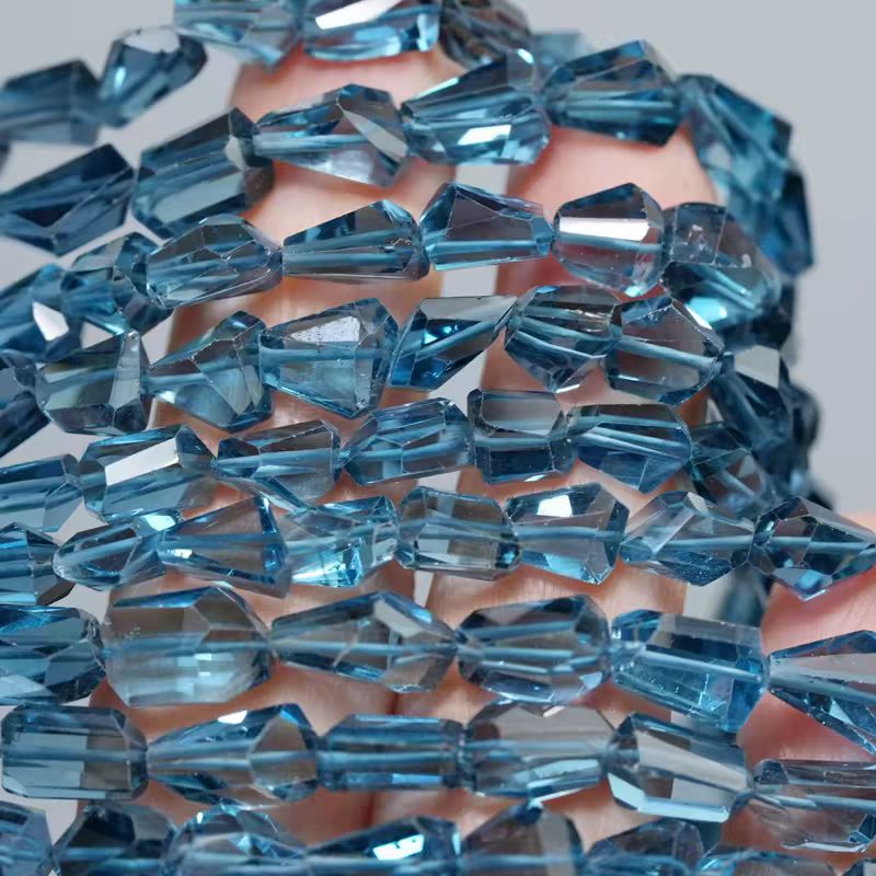 Jewelry Making In London - Perle Sfaccettate Barocche di Topazio Blu